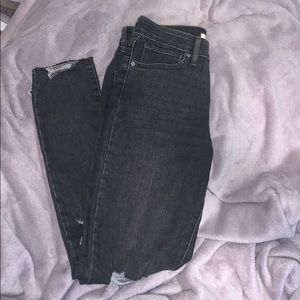Levi’s black ripped jeans